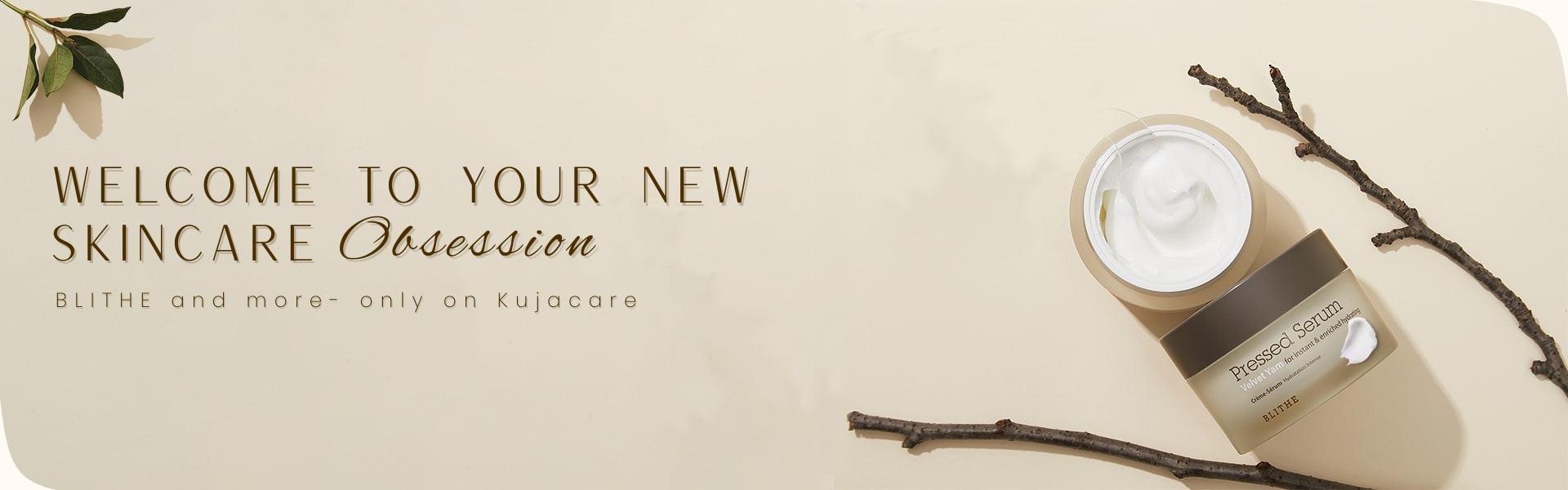 Skincare product with branches on a beige background, featuring text about a new skincare obsession.