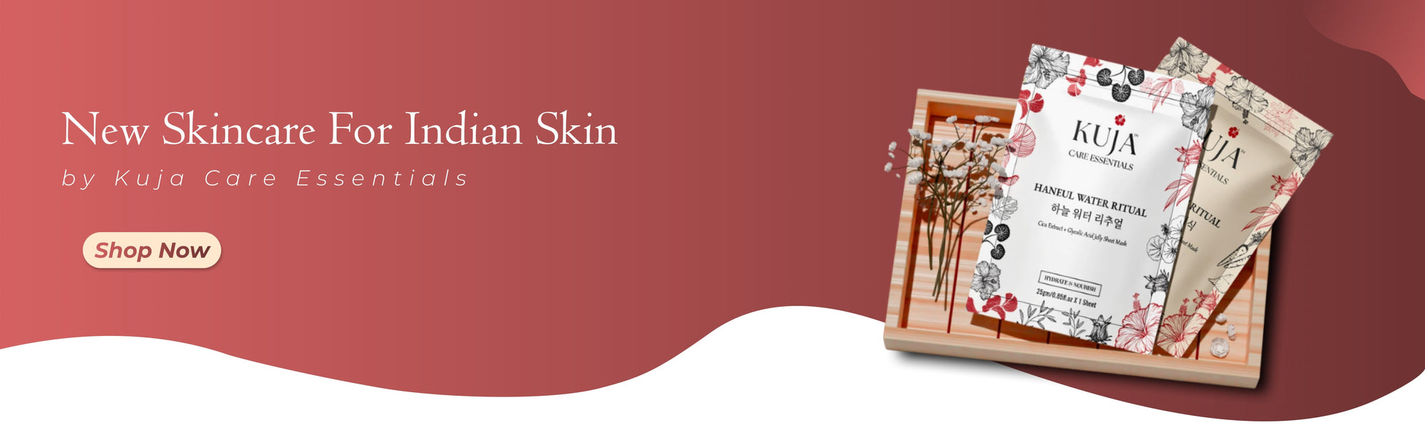 Promotional banner for skincare products with 'Kuja Care Essentials' on a maroon background.